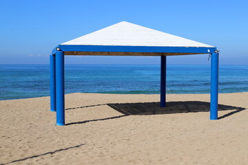 sunshade in city park on the seashore