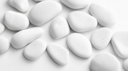 White stones grouped together on a clean background, perfect for minimalist designs