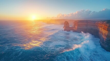 Golden sunset over dramatic ocean cliffs and waves.