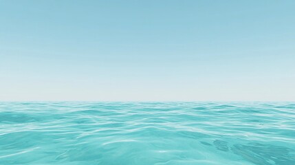 Obraz premium A serene seascape with turquoise waves gently rolling under a clear blue sky horizon