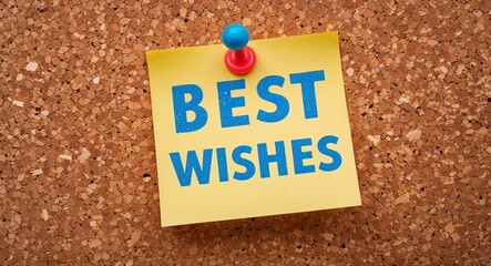 best wishes word written on a note sticky on corkboard