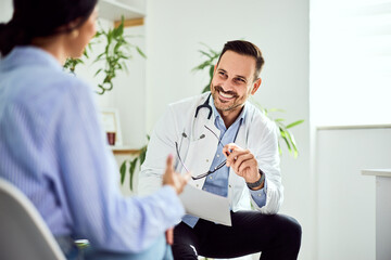 Doctor Consulting Patient in Modern Medical Office with a Friendly Environment