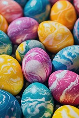 A bunch of eggs with different colors and patterns. The eggs are arranged in a way that they look like they are painted with different colors. Concept of creativity and playfulness
