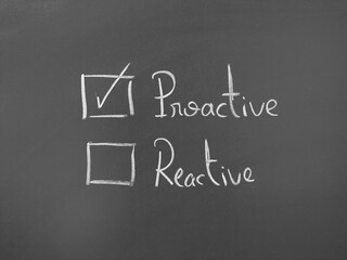 Proactive selected over reactive written on a chalkboard