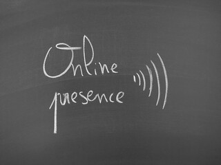 Online presence written on a chalkboard with waves symbolizing communication