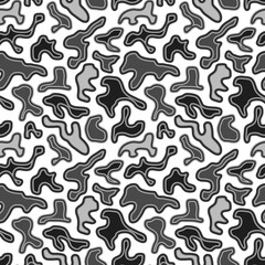 seamless pattern features abstract, organic shapes in black, white, and gray, creating a modern and stylish camouflage design with a dynamic and fluid appearance