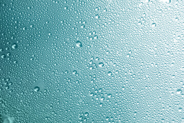Turquoise background with water drops with texture