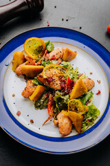 Grilled chicken salad with citrus and greens, a perfect mix of freshness and savory flavors