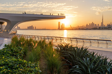 Stunning sunset view of Downtown Dubai skyline from Dubai Creek Harbour, UAE, capturing the beauty of modern urban landscapes and travel destinations