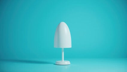 White Egg-Shaped Lamp on Teal Background