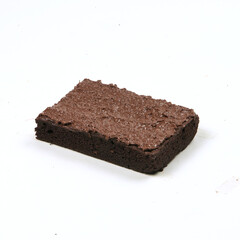 A moist chocolate brownie topped with smooth chocolate frosting sits elegantly on a plain surface, ideal for dessert enjoyment