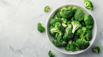 broccoli in a bowl on a white background