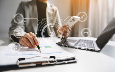 Digital marketing media in virtual screen.businesswoman hand working with mobile phone and modern...