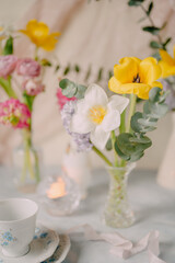 Elegant Breakfast Table Setting with Spring Flowers in Soft Tones