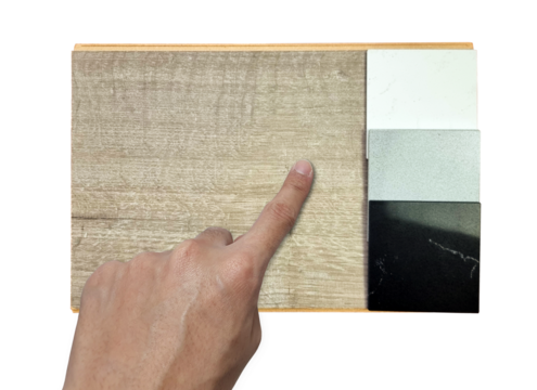 architect chooses interior material samples consists palette of artificial stone in white, grey, black colors tone and light oak engineering floor tile isolated on background with clipping path. 