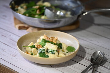 Homemade Potato Gnocchi with Spinach, Blue Cheese, and Walnuts – Creamy Sauce