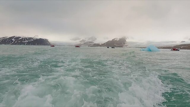 POV riding boats around ice in Svalbard seas