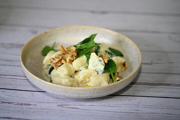 Homemade Potato Gnocchi with Spinach, Blue Cheese, and Walnuts – Creamy Sauce