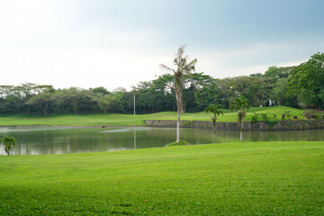 Scenic Landscape Featuring a Serene Lake and Verdant Surroundings