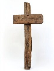 A wooden cross with a sign on it. The sign is empty and the cross is old and weathered