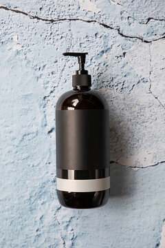 Plastic bottle container with pump and blank label.