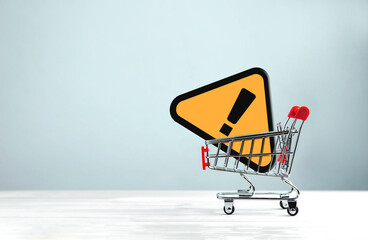 An exclamation mark in the shopping cart. E-commerce business product sales notifications, order...
