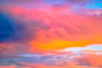 Sunset and clouds tinged in pink