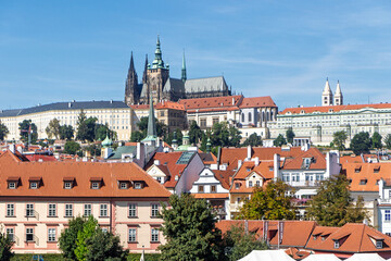 Spring Prague gothic Castle with the Lesser Town above River Vltava in the sunny Day, Czech Republic