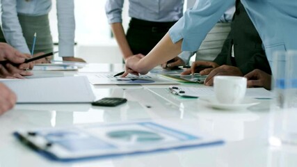 Businesswoman and businessman discussing strategy and planning in a corporate conference meeting with teamwork marketing executive leadership and negotiation skills