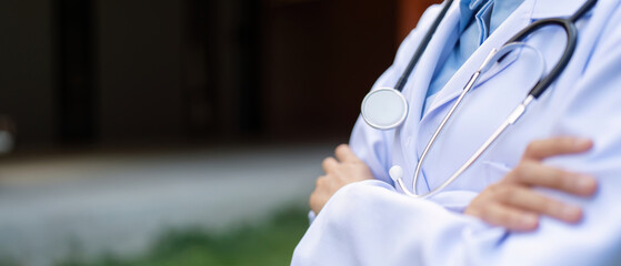 Dedicated doctor in a white coat with stethoscope, embodying healthcare professionalism.