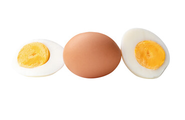 Side view of raw chicken egg and peeled cooked or boiled egg with egg yolk in two halves in stack isolated on white background with clipping path