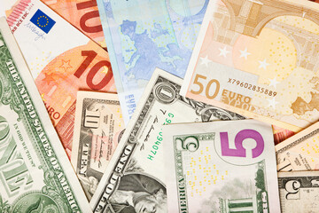 Background of various dollar and euro bills