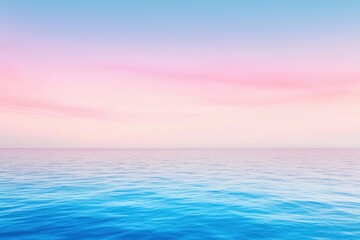 Obraz premium Sunrise Over Lake Gradient: A serene lake with a sky transitioning from pale pink at the horizon to deep blue at the top.