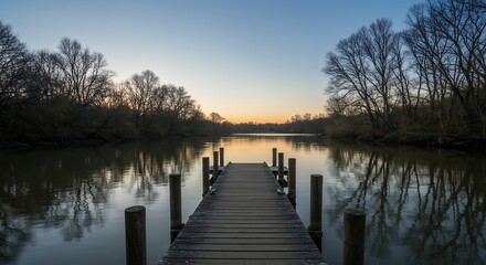 Naklejka premium Serene Sunset Lake Dock Landscape Photography