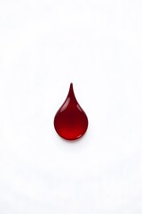 Obraz premium A vivid red blood drop suspended in purity, symbolizing the power of one donation. 