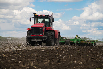 Versatile cultivator with disk, cultivate, harrow tools for secondary tillage