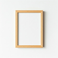 picture frame on a white wall. Minimal wooden picture poster frame mockup on white wallpaper.