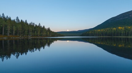 Obraz premium Serene lake reflecting moon, forest, mountains. Perfect for travel brochures