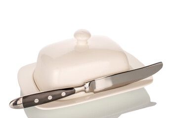 One ceramic butter container with a metal knife, close-up, isolated on a white background.