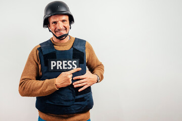Reporter with bulletproof vest on white background.