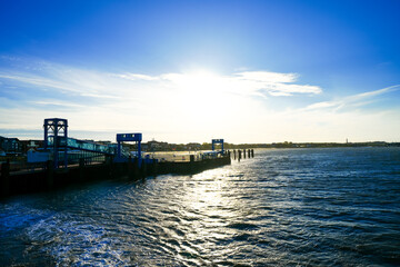 Landscape with a view of the harbor and the North Sea near Wittd&uuml;n on Amrum.

