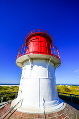 View of the dunes on the North Frisian island of Amrum. Landscape in the north. Nature on the North Sea island with the Norddorf leading and cross-marking fire.
