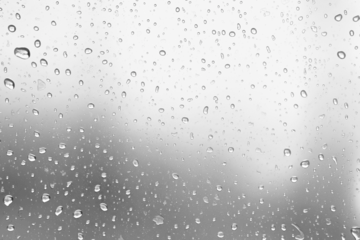PNG Raindrops on glass surface background droplets texture.