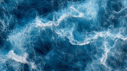Fototapeta premium Deep Blue Ocean Waves, Aerial View of Turbulent Water with Whitecaps, Nature Background