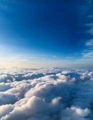Fototapeta premium 広がる雲海の上空からの視点、無限に広がる白い雲