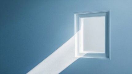 Sunlight streams through small window in blue room