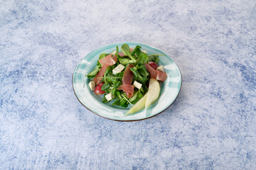 tasty and healthy salads in a plate on a beautiful background