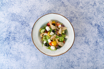 tasty and healthy salads in a plate on a beautiful background