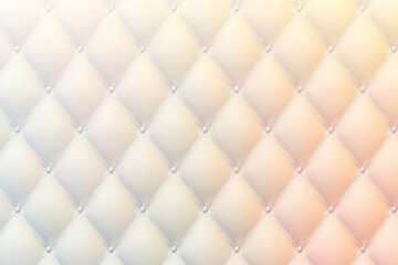 Fototapeta premium Soft, textured background featuring a quilted pattern with subtle color gradients, ideal for design use