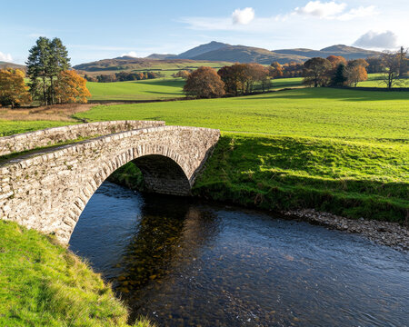 Rural property loan. serene countryside scene with old stone bridge over river